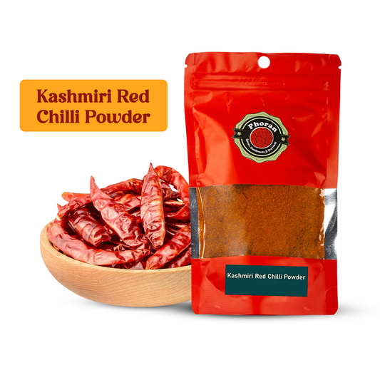 A package of Phoran brand Kashmiri Red Chili Powder, with a bowl of red chili powder and fresh red chili peppers in the background, against a white background.